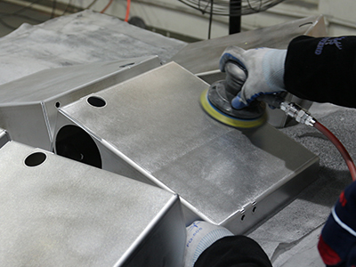 Sheet metal surface finishing step